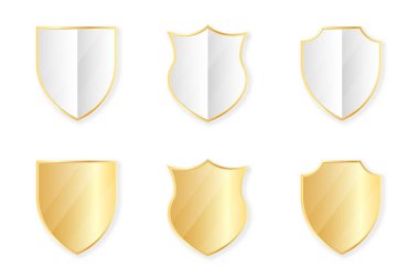 Gold shields collection. Golden badges and labels in shield shape. Protection and security concept design element. Vector