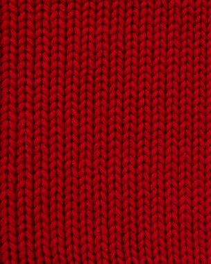 Yünlü kırmızı örgü sıcak kumaş arkaplanı