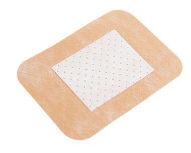 Kahverengi elastik alçı beyaz arka planda izole edilmiş.