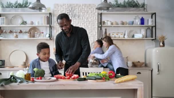 Handsome African Father Son Preparing Tasty Salad Kitchen While Choping — Stock Video