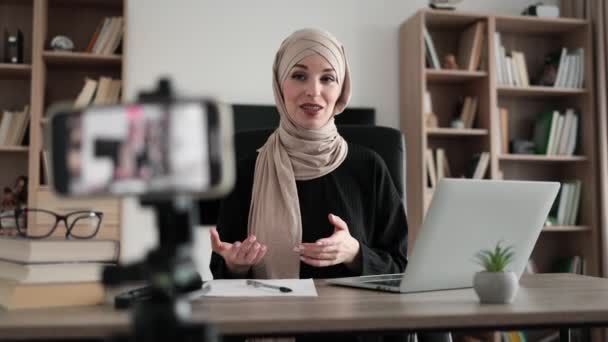 Charming Muslim Woman Hijab Talking Gesturing While Recording Video Modern — Stockvideo