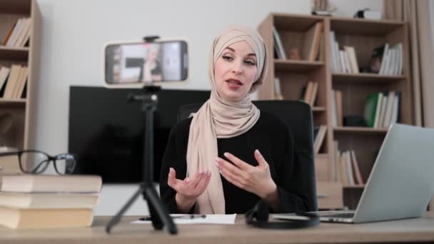 Charming Muslim Woman Hijab Talking Subscribers While Recording Video Modern — Stockvideo