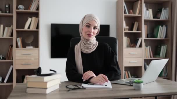 Smiling Positive Confident Muslim Woman Formal Wear Hijab Sitting Office — Stock video