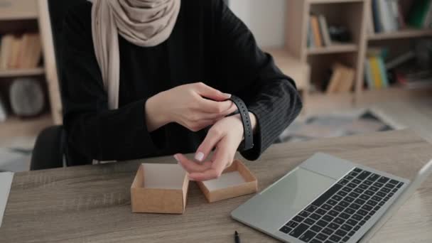 Cropped View Hands Muslim Woman Unpacking Box New Smart Watch — Stockvideo