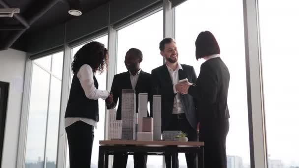 Team Diverse Four Multiethnic Businesspeople Shaking Hands Each Other Preparing — Vídeos de Stock