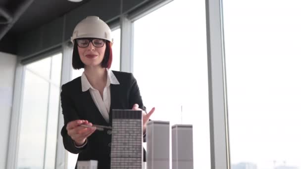 Qualified Female Architect Engineer Suit Hard Hat Measuring Skyscraper Model — Video