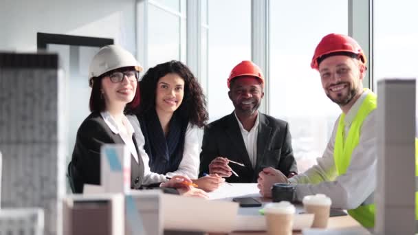 Multiracial Coworkers Builders Architects Sitting Table Blueprints Gadgets Design Buildings — Vídeos de Stock