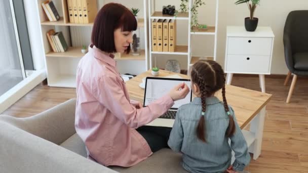 Back View Mother Touching Daughters Cheek While Using Portable Computer — Stock Video