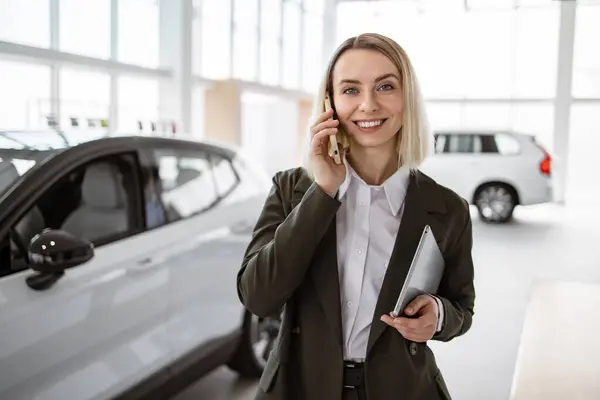 Professional Confident Sales Person Working Modern Car Dealership Smiling Saleswoman Stock Photo