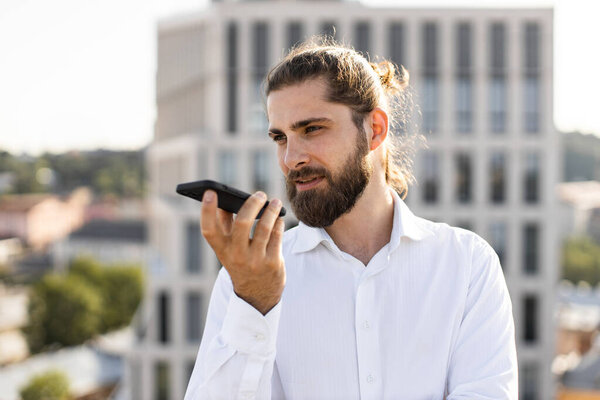 Confident Businessman Speaking Smartphone Outdoors Professional Man Recording Voice Message Stock Image