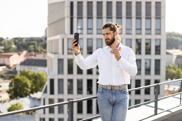 Businessman Standing Rooftop Casual Attire Smartphone Taking Selfie Cityscape Background Royalty Free Stock Photos