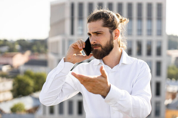 Young Businessman Engaged Conversation Smartphone Outdoors Downtown Professional Appearance Business Stock Photo