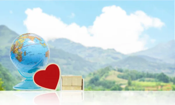 Earth Day concept. World Health Day concept. Love the world. on mountain views background.