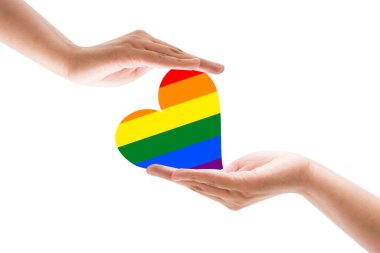 PRIDE ayı için el gökkuşağı yumruğu ve LGBTQIA + hareketi. Cinsel özgürlük için gurur günü, aşk çeşitliliği kutlaması ve insan hakları için mücadele.