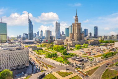 Traffic in Warsaw downtown, aerial view of Palace of Science and Culture and skyscrapers, Poland clipart