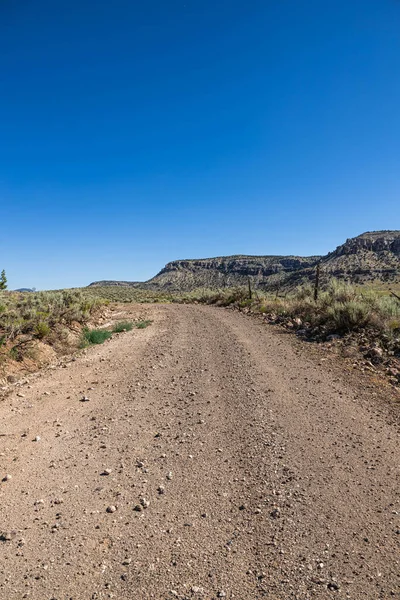 Dirt Road Stretching Vast Arid Valley Northern Arizona Clear Blue — Stock Photo, Image