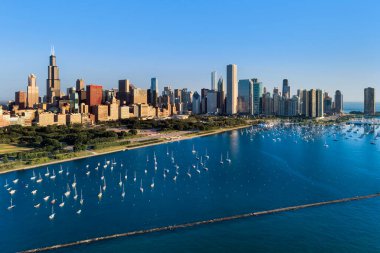 Aerial view of Monroe Harbor with the skyline of Chicago beyond.