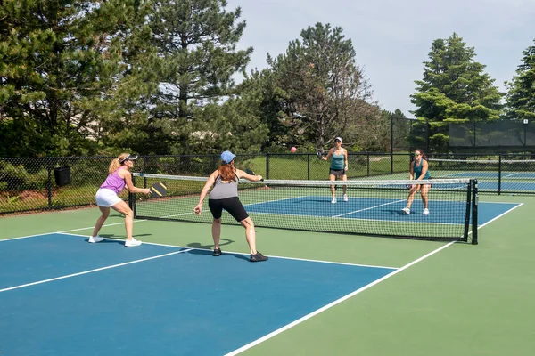 Two Players Approach Net Comptetivie Doubles Game Pickleball Blue Green — Stock Photo, Image