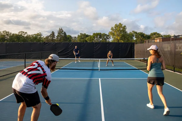 Four Pickleball Players Rally Each Other Two Baseline Ready Drop Royalty Free Stock Photos