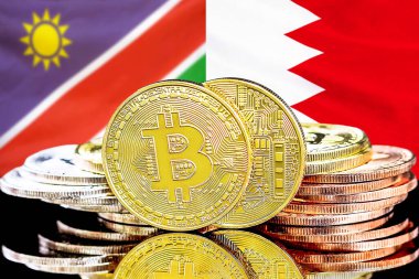 Bahreyn bayrağı ve Namibya arkaplanındaki bitcoinler. Bahreyn ve Namibya 'daki kripto para birimi ve engelleme teknolojisi yatırımcıları için kavram
