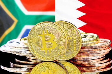 Bahreyn bayrağı ve Güney Afrika arka planı üzerinde Bitcoins. Bahreyn ve Güney Afrika 'daki kripto para birimi ve engelleme teknolojisi yatırımcıları için kavram