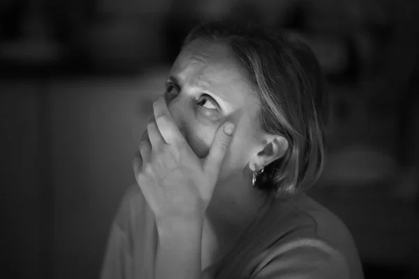 Black and white image of woman depression or domestic violence. People, grief and domestic violence concept. Closeup of unhappy scared crying woman. Stop the violence