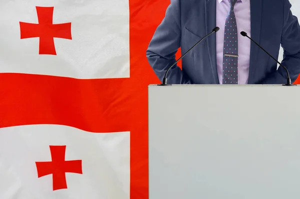 Tribun Med Mikrofon Och Man Kostym Georgia Flagga Bakgrund Affärsman — Stockfoto
