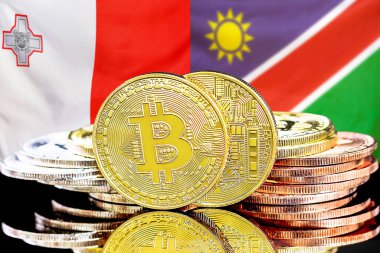 Malta ve Namibya bayrağı arkaplanındaki bitcoinler. Malta ve Namibya 'daki kripto para birimi ve engelleme teknolojisi yatırımcıları için kavram