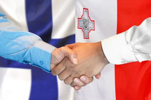 Üzleti Kézfogás Két Zászló Hátterében Férfiak Kezet Ráznak Finn Zászló — Stock Fotó