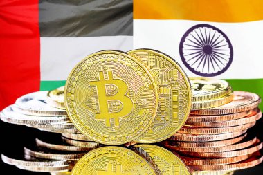 Birleşik Arap Emirlikleri ve Hindistan bayrağı üzerinde Bitcoin 'ler. BAE ve Hindistan 'daki kripto para birimi ve engelleme teknolojisi yatırımcıları için kavram