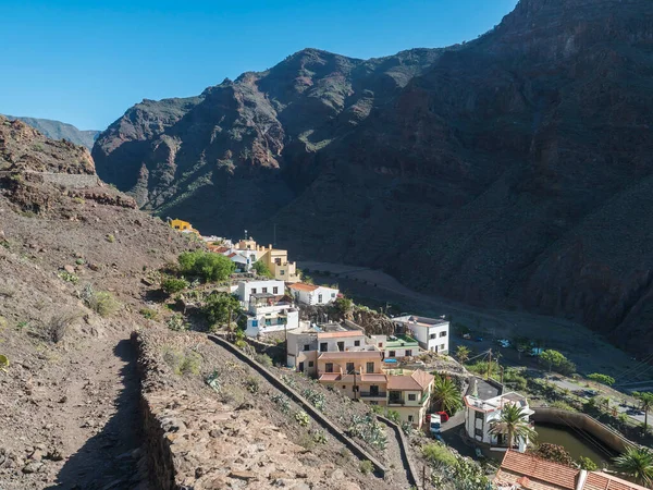 stock image View of picturesque village La Calera in the Valle Gran Rey of the Canary Island La Gomera, Spain. Colorful houses on mountain slopes