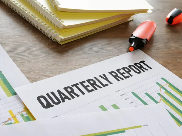 Quarterly report is shown using a text