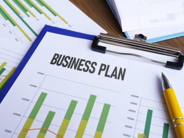 Business plan strategy is shown using a text with presentation clipart