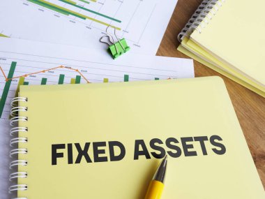 Fixed assets are shown using a text on the journal clipart
