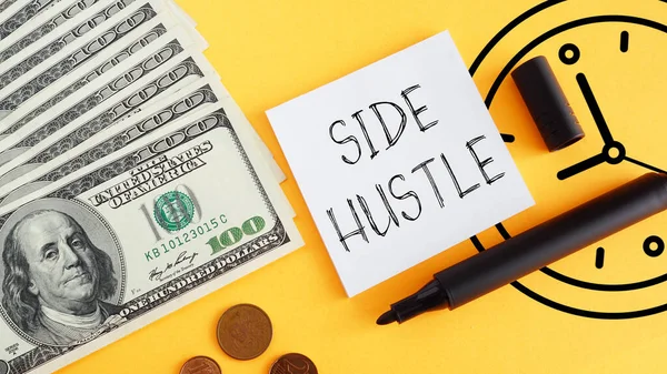 stock image Side Hustle is shown using a text and photo of dollars and the clock