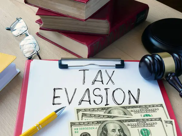 Tax evasion is shown using a text and photo of dollars and gavel