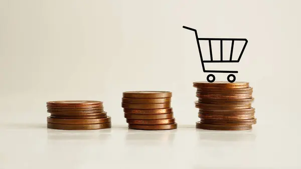 Sale volume increase to make a business grow. Coin stocks with with shopping cart. Sales increase.