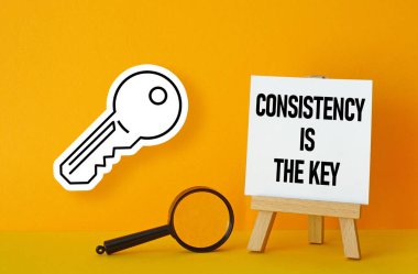 Business concept meaning Consistency is the key. clipart