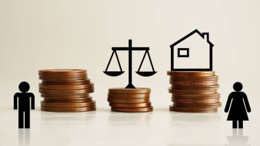 Medeni mülkiyet. Karı koca boşanma sürecinde bir evi paylaşıyorlar. Mülkiyet Bölümü Anlaşması.