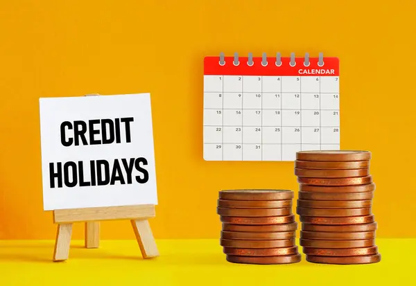 stock image Credit holidays is shown using a text as financial concept