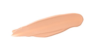 Sıvı temel ya da BB smear beyaz arka planda izole. Cilt rengi, krem kumaş örneği..