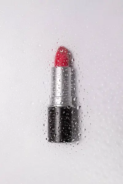 Close Image Red Lipstick Black Silver Tube Covered Water Droplets — Stock Photo, Image