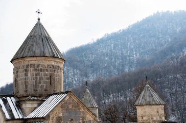 Christian church in the forest. Old monastery complex. Apostolic church