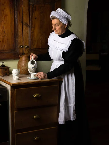 Victorian Maid Servant Black Dress Lace Cap White Apron Working — Stock Photo, Image