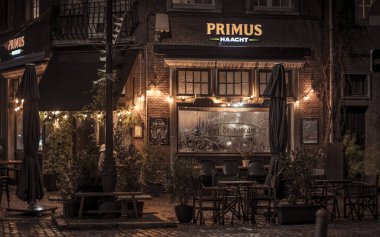 Antwerp, Belgium, January 2nd 2024: Night view on bar and restaurant In De Roskam on Vrijdagmarkt in Antwerp, Belgium