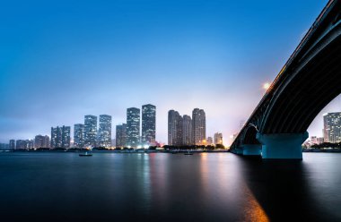 Night view of Changsha, city scenery along the Xiangjiang River, Hunan, China. clipart