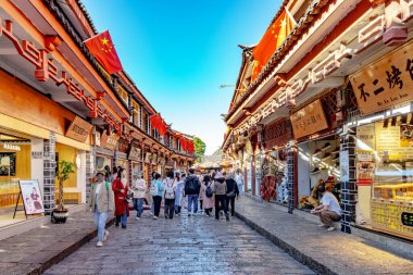 Lijiang, China - October 23,2023 : Scenic view of the Old Town of Lijiang in Yunnan, China. The Old Town of Lijiang is a UNESCO World Heritage Site and also a famous tourist destination of Asia. clipart