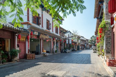 JIANSHUI, CHINA, OCTOBER 29, 2024: Detail view of the main shopping street in chinese city jianshui. clipart