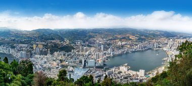 Bird's eye view of Jinhu Lake and city scenery, Gejiu, Yunnan, China. clipart