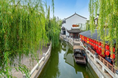 Jiangnan-style historic buildings in the Red River water village of Mile, Yunnan, China. clipart